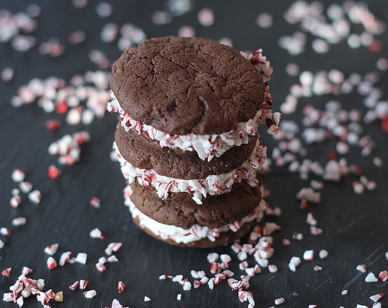 Chocolate Peppermint Sandwich Cookies with Buttercream + Crushed Candy Canes | Plum Pie